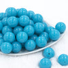 Front view of a pile of 20mm Neon Blue Solid Acrylic Chunky Bubblegum Beads