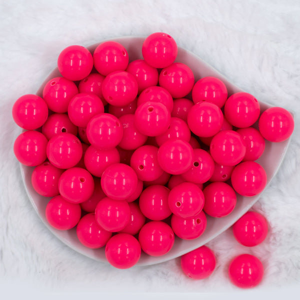 top view of a pile of 20mm Neon Pink Solid Bubblegum Beads