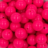 close up view of a pile of 20mm Neon Pink Solid Bubblegum Beads