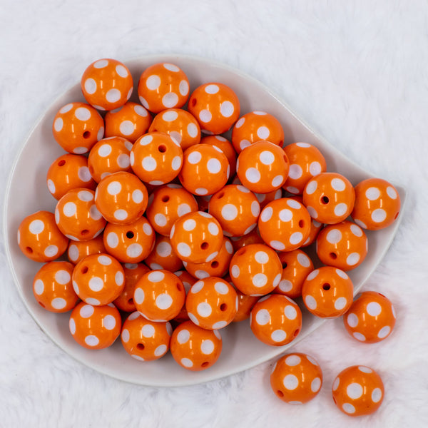 top view of a pile of 20mm Orange with White Polka Dots Acrylic Bubblegum Beads