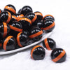 front view of a pile of 20mm Orange Band on Black Bubblegum Beads
