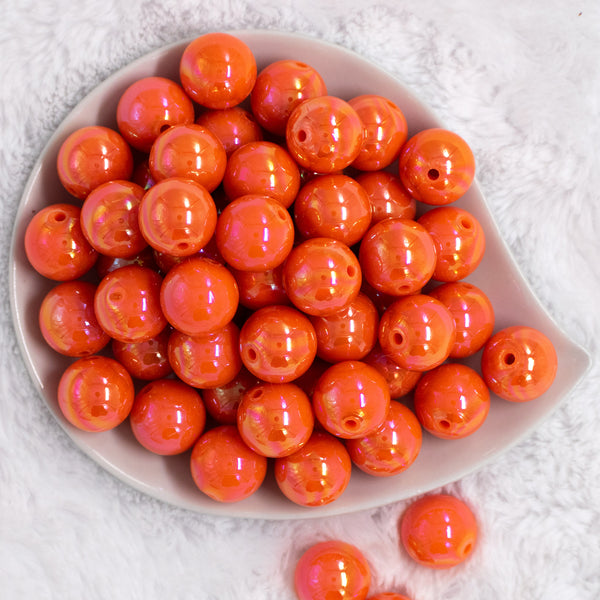 Top view of a pile of 20mm Orange Solid AB Bubblegum Beads