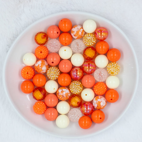 top view of a pile of 20mm Orange Julius Mix Bubblegum Bead Mix - 50 Count