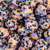 close up view of a pile of 20mm Purple, Orange & Black Confetti Rhinestone AB Bubblegum Beads