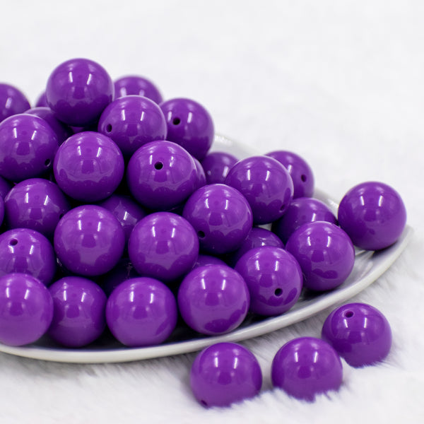 front view of a pile of 20mm Orchid Purple Solid Bubblegum Beads