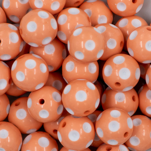 close up of a pile of 20mm Peach with White Polka Dots Bubblegum Beads