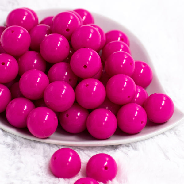 Front view of a pile of 20mm Peony Pink Solid Bubblegum Beads
