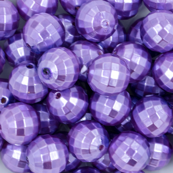 close-up view of a pile of 20mm Iris Purple Disco Faceted Pearl Chunky Bubblegum Beads