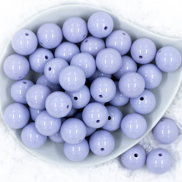 top view of a pile of 20mm Periwinkle Purple Solid Bubblegum Beads