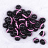 top view of a pile of 20mm Pink Band on Black Bubblegum Beads