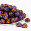 front view of a pile of 20mm Orange, Purple & Black Confetti Rhinestone AB Bubblegum Beads