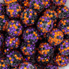 close up view of a pile of 20mm Orange, Purple & Black Confetti Rhinestone AB Bubblegum Beads