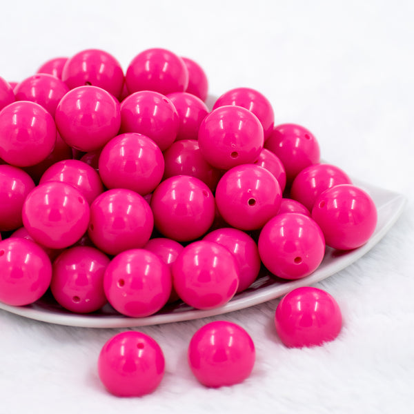 front view of a pile of 20mm Hubba Bubba Pink Solid Bubblegum Beads