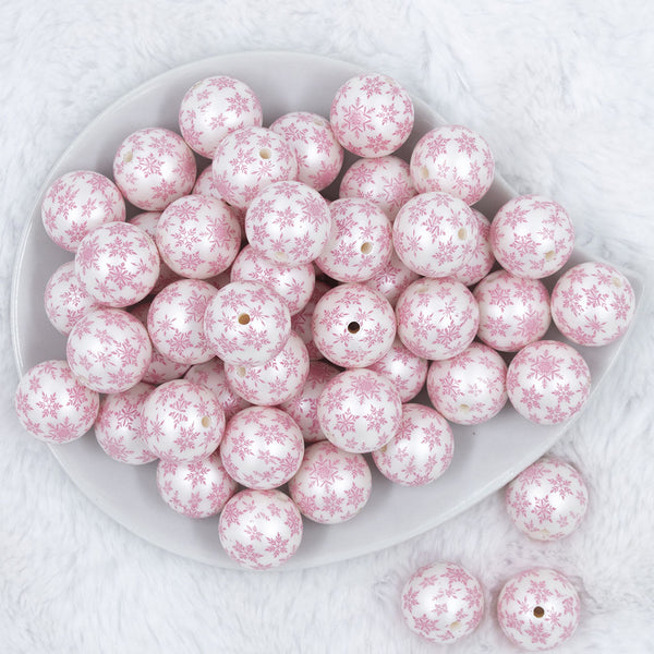 Top view of a pile of 20mm Pink Snowflake Print on White Acrylic Bubblegum Beads