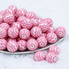 Front view of a pile of 20mm Light Pink with Chevron on a White Matte Chunky Acrylic Bubblegum Beads