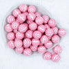 Top view of a pile of 20mm Light Pink with Chevron on a White Matte Chunky Acrylic Bubblegum Beads