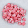 top view of a pile of 20mm Pink Tablet Acrylic Bubblegum Beads