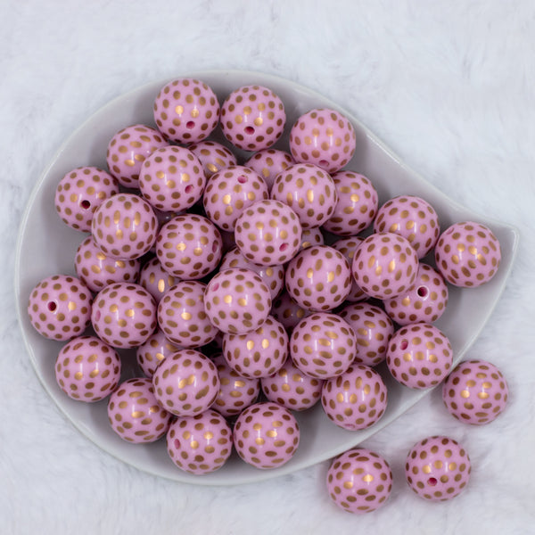 top view of a pile of 20mm Pink with Gold Spots Print Acrylic Bubblegum Beads