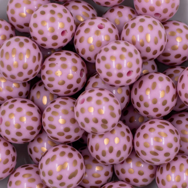 close-up view of a pile of 20mm Pink with Gold Spots Print Acrylic Bubblegum Beads