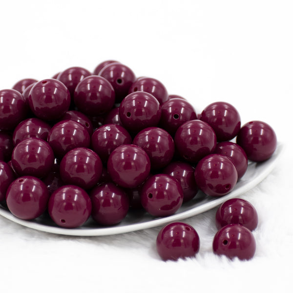 front view of a pile of 20mm Plum Purple Solid Bubblegum Beads