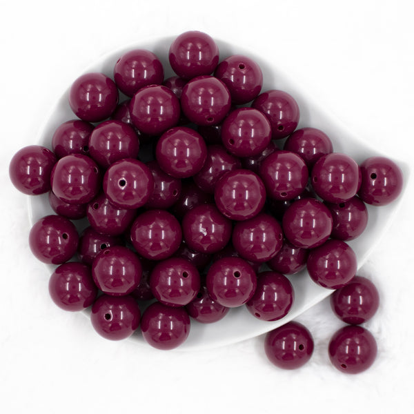 top view of a pile of 20mm Plum Purple Solid Bubblegum Beads