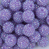 Close up view of a pile of 20mm Pretty Purple Rhinestone AB Bubblegum Beads
