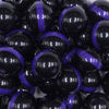 close up view of a pile of 20mm Purple Band on Black Bubblegum Beads