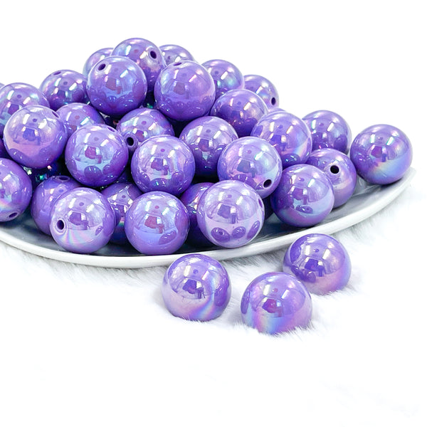 front view of a pile of 20mm Periwinkle Purple Solid AB Bubblegum Beads