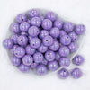 top view of a pile of 20mm Periwinkle Purple Solid AB Bubblegum Beads