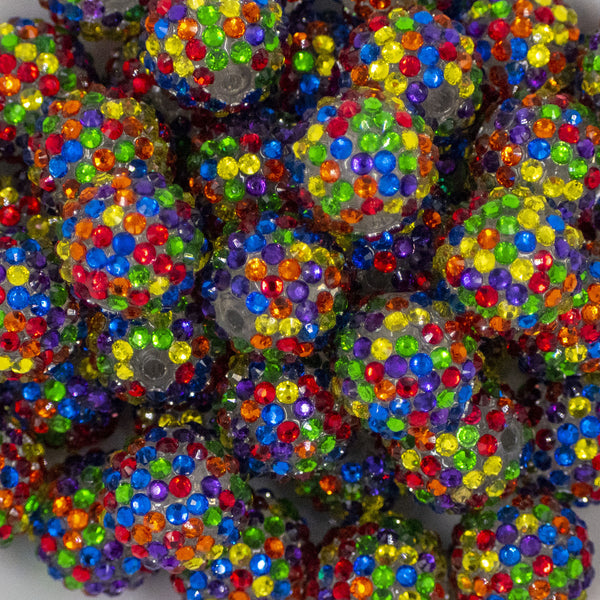 Close up view of a pile of 20mm Rainbow Confetti Rhinestone AB Bubblegum Beads