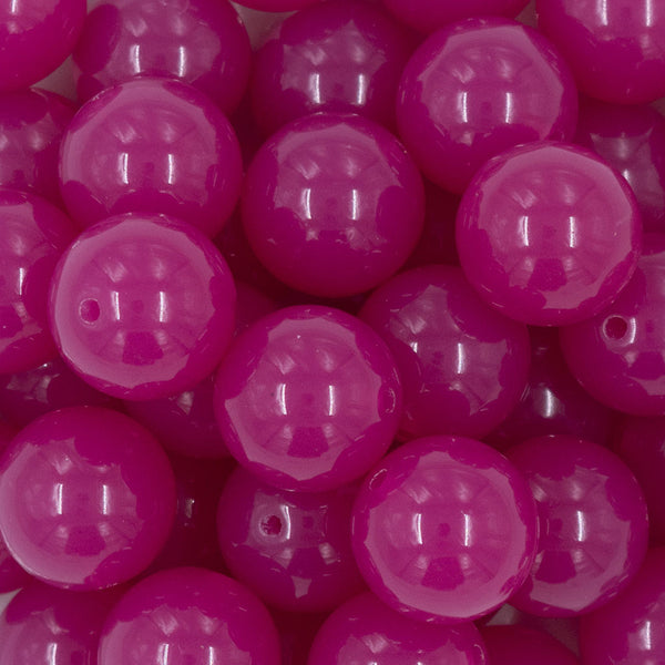 Close up view of a pile of 20mm Raspberry Pink 