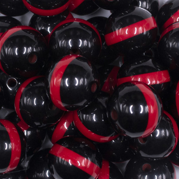close up view of a pile of 20mm Red Band on Black Bubblegum Beads