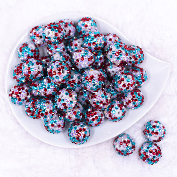 Top view of a pile of 20mm Red, Teal and White Confetti Rhinestone AB Bubblegum Beads