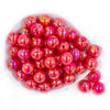 top view of 20mm Candy Apple Red Crackle AB Chunky Bubblegum Beads on a white plate