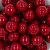 close-up of a pile of 20mm Solid Cranberry Red Chunky Bubblegum Beads