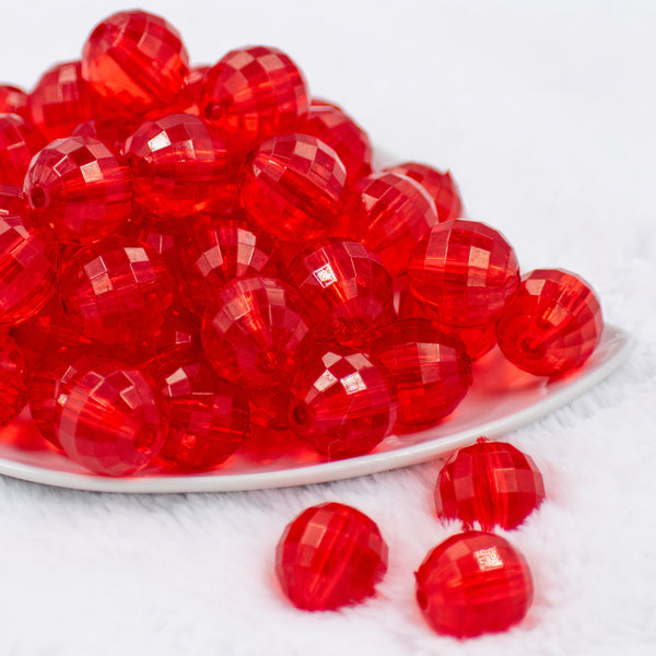 Front view of a pile of 20mm Red Transparent Disco Faceted Chunky Acrylic Bubblegum Beads