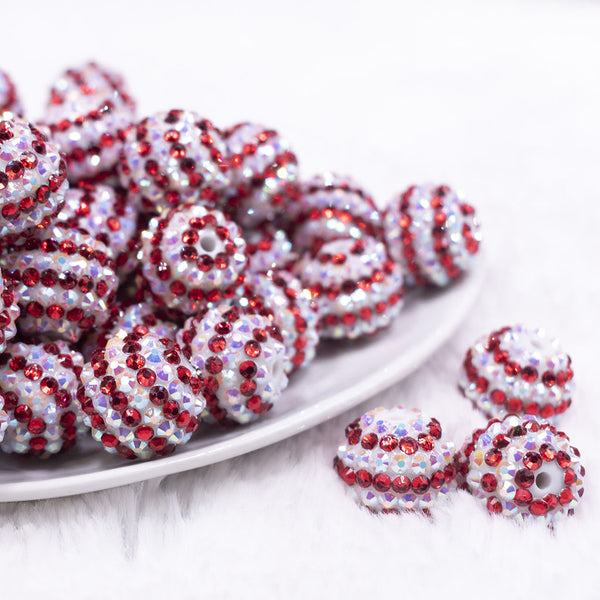 Front view of a pile of 20mm Red & White Striped Rhinestone AB Bubblegum Beads