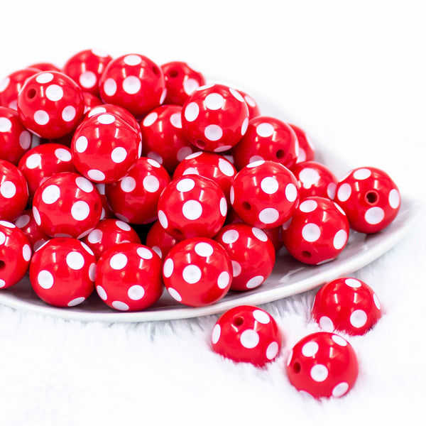 Front view of a pile of 20mm Red with White Polka Dots Acrylic Bubblegum Beads