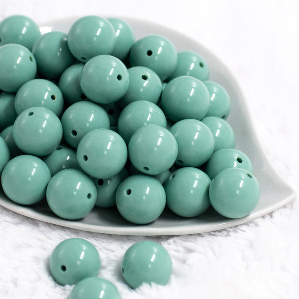Front view of a pile of 20mm Robin Blue Solid Bubblegum Beads