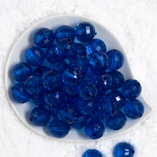 Top view of a pile of 20mm Royal Blue Transparent Disco Faceted Pearl Bubblegum Beads