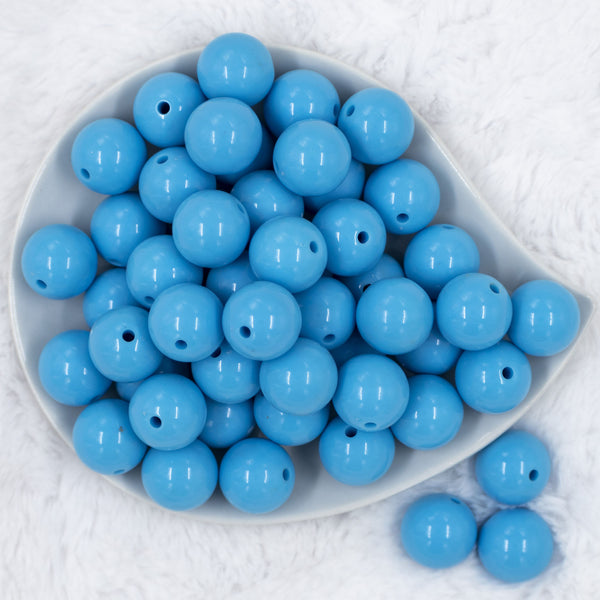 Top view of a pile of 20mm Maya Blue Solid Chunky Acrylic Bubblegum Beads