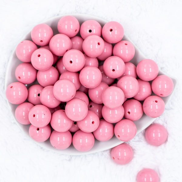 Top view of a pile of. 20mm Mauve Pink Solid Chunky Acrylic Bubblegum Beads