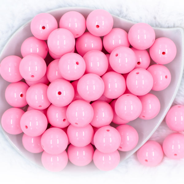 top view of a pile of 20mm Pink Solid Bubblegum Beads
