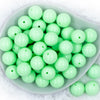top view of a pile of 20mm Spearmint Green Solid Chunky Bubblegum Beads