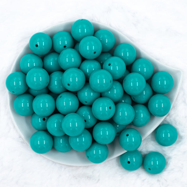 top view of a pile of 20mm Teal Green Solid Bubblegum Beads