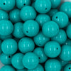 close up view of a pile of 20mm Teal Green Solid Bubblegum Beads