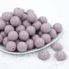Front view of a pile of 20mm Thistle Purple Solid Acrylic Chunky Bubblegum Beads