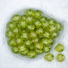 top view of a pile of 20mm Lime Green Transparent Pumpkin Shaped Bubblegum Beads