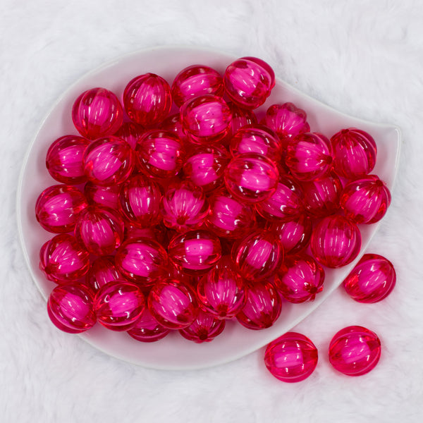 top view of a pile of 20mm Pink Transparent Pumpkin Shaped Bubblegum Beads