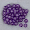 Top view of a pile of 20mm Purple Transparent Pumpkin Shaped Bubblegum Beads